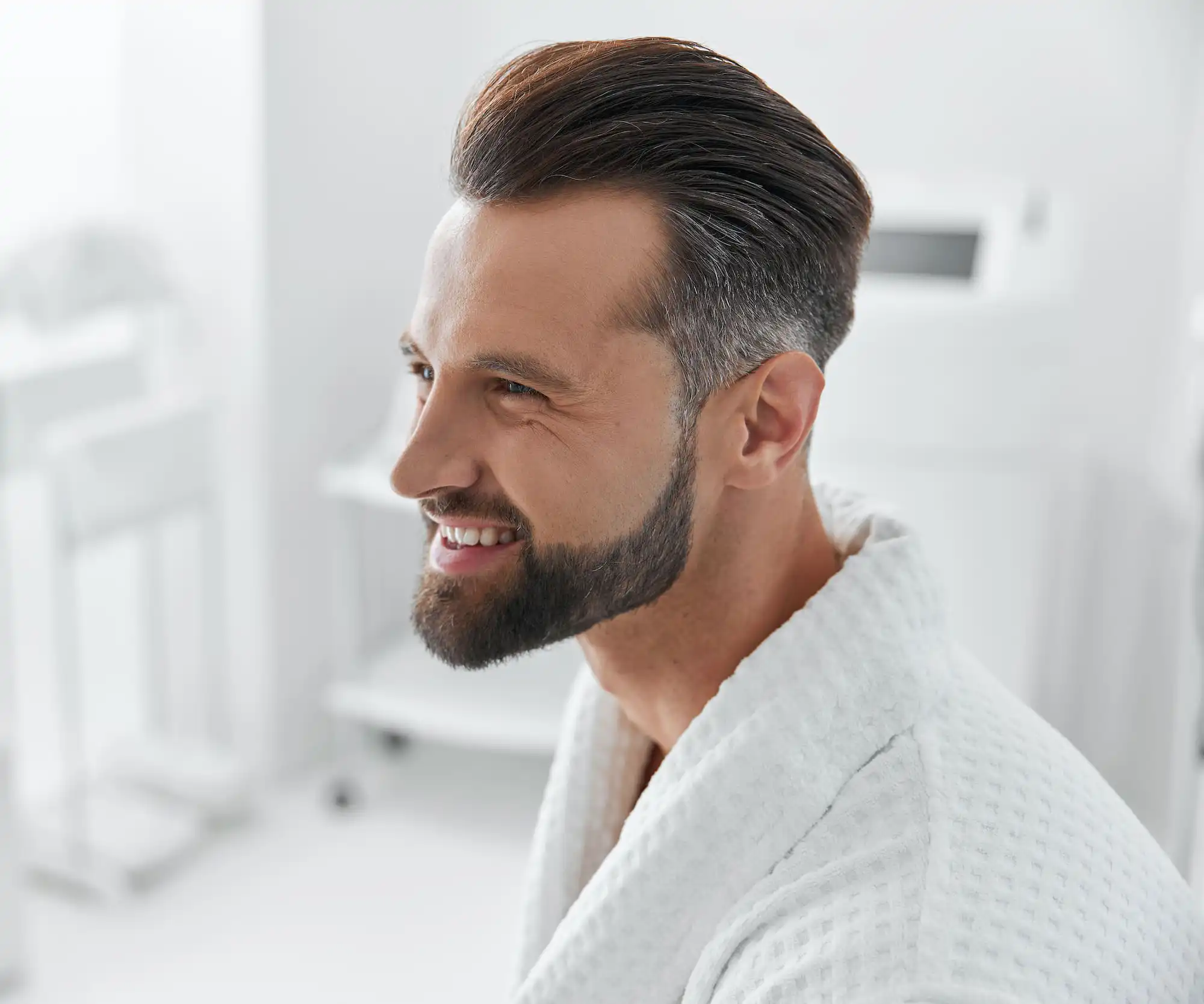 Man with a comb over haircut