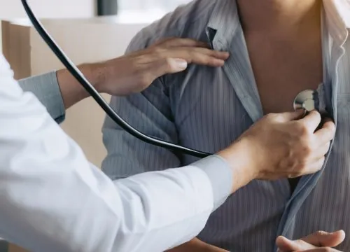 Doctor performing physicals