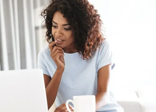 Woman on her laptop at home