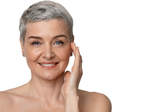 Photo of a woman touching the fine lines and wrinkles on her face