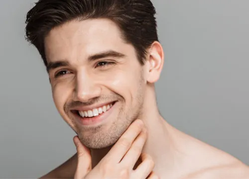 Young man with his hand on his chin