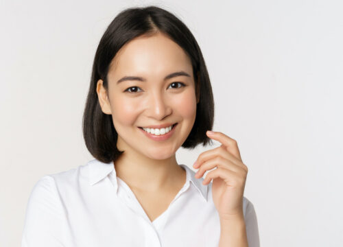 Photo of a smiling woman after Potenza™ RF microneedling treatments