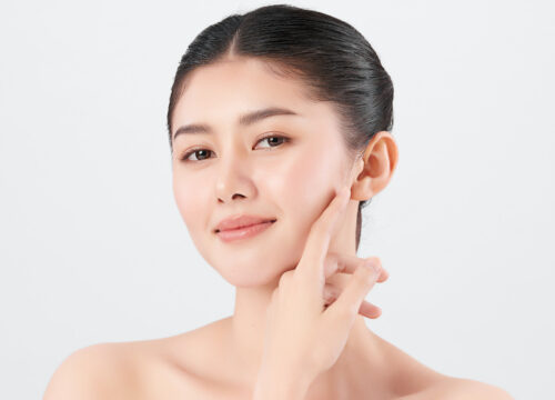 Photo of a woman with radiant skin after HydraFacial® treatments
