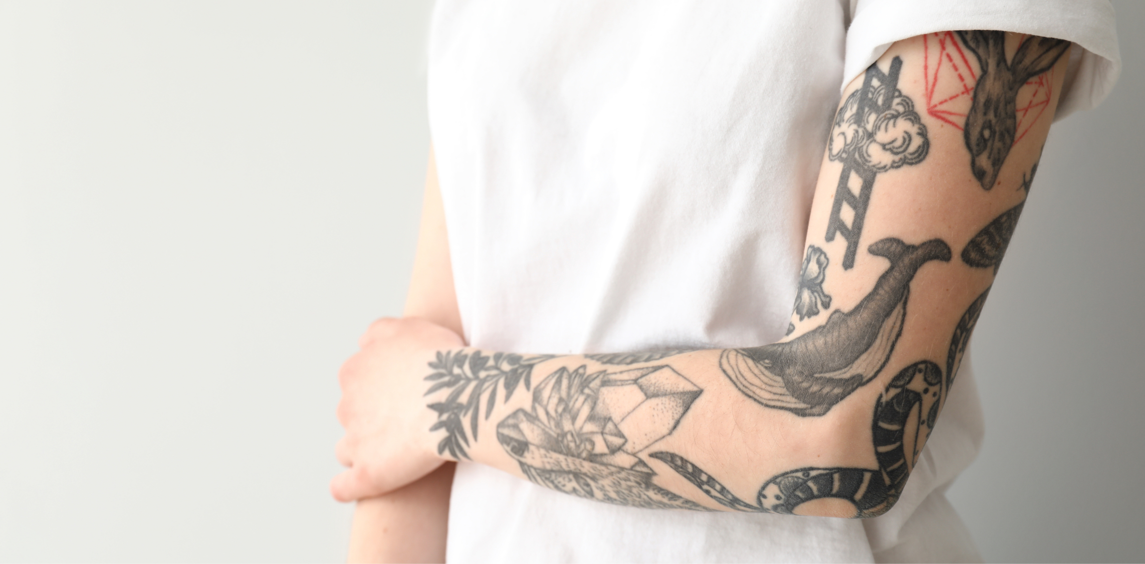 Photo of a tattoos on a woman's arm